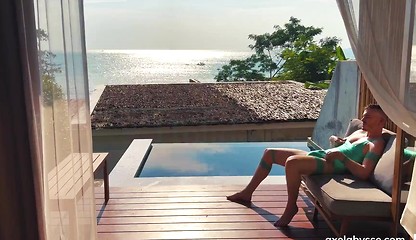 Sea, sex and sun. On a quiet afternoon by the pool, Axel plays...